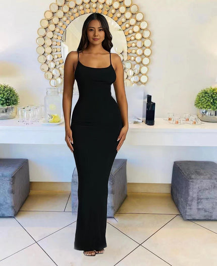 Black sleeveless maxi dress with straight neckline and fitted column silhouette.