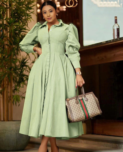 Light green midi A-line dress with puff sleeves and pleated skirt, button-front