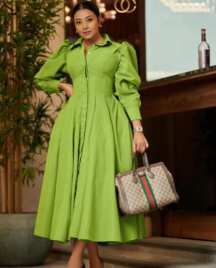 Green midi A-line dress with puff sleeves and pleated skirt, button-front