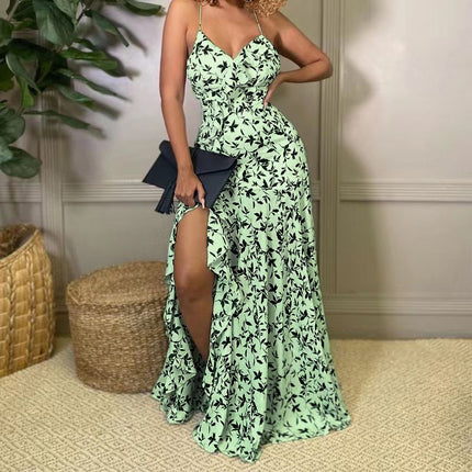 Green maxi dress with spaghetti straps, floral print, and side slit