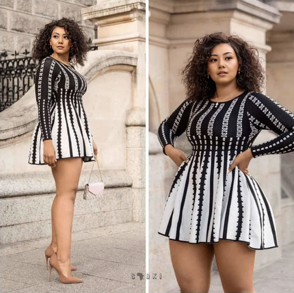 Geometric knit A-line mini dress with black-and-white striped pattern, long sleeves