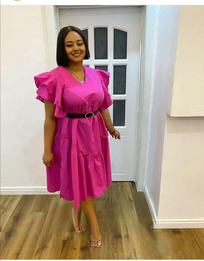 Pink ruffle-sleeve midi dress with layered hem, V-neck, and black belt