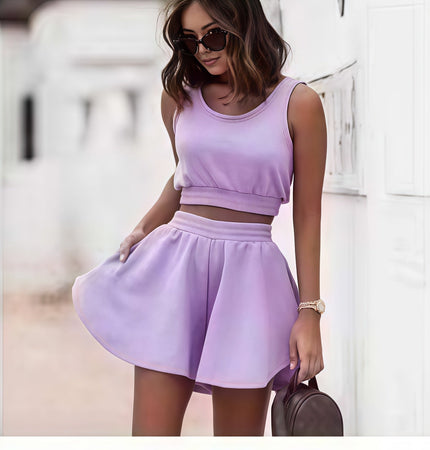 Lavender pleated skirt set with sleeveless cropped top and gathered waist