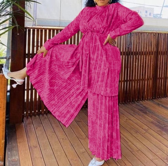 Hot-pink pleated belted twin set: long skirt with loose tunic top