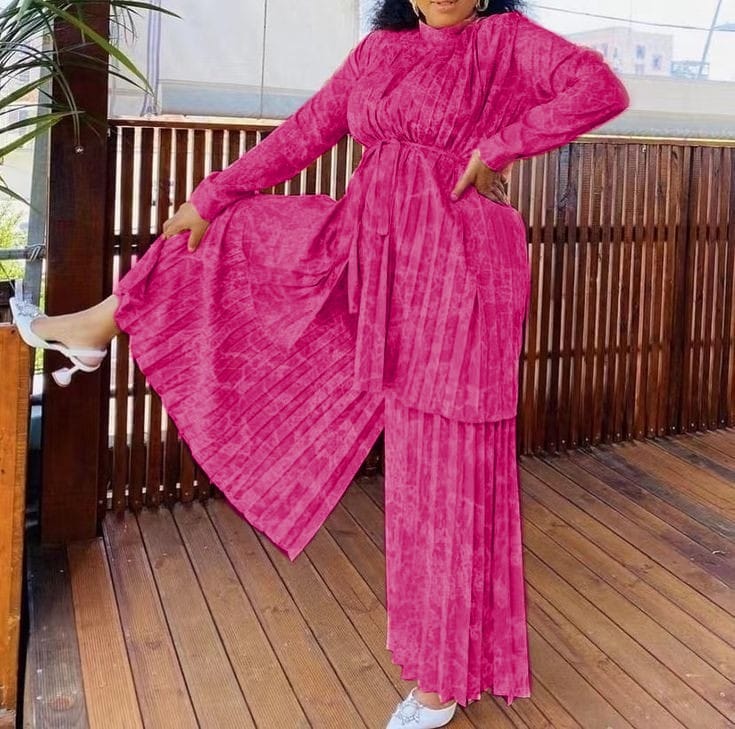 Hot-pink pleated belted twin set: long skirt with loose tunic top