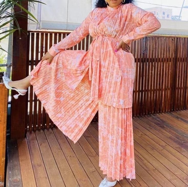 Peach pleated twin set with waist belt: loose tunic and flowing long skirt