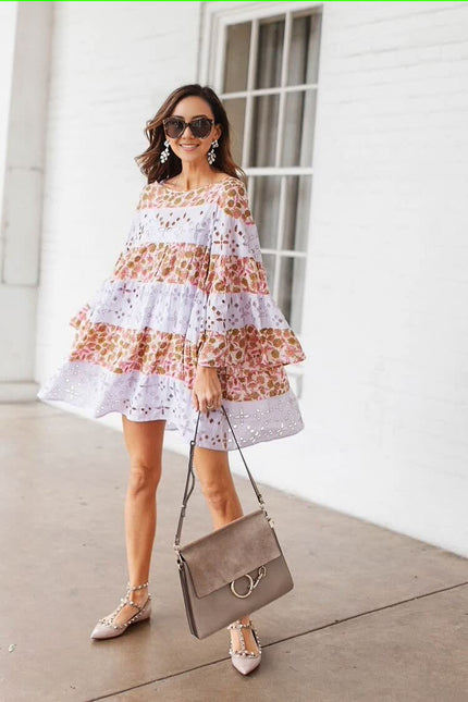 Floral layered dress with tiered ruffles, white base and orange floral print