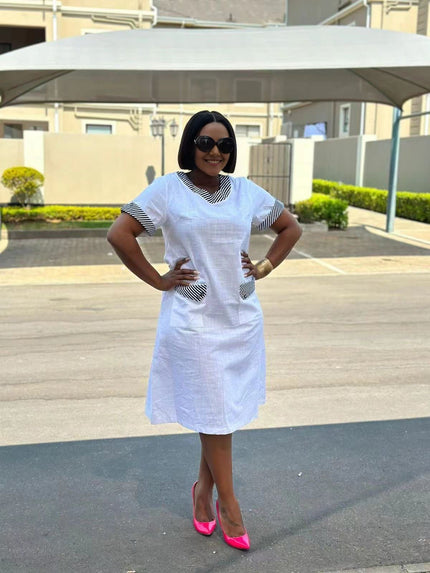 White midi dress with striped collar and side pockets