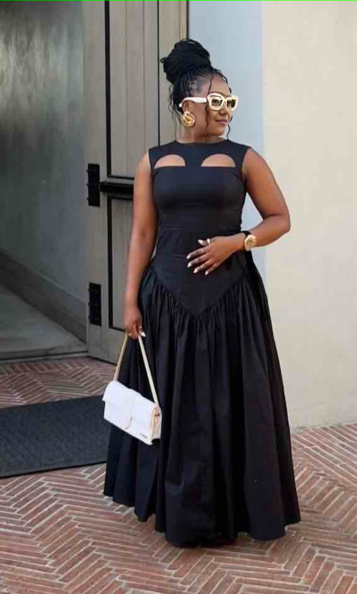 Pleated maxi dress with sleeveless cutout bodice and tiered skirt, dark color