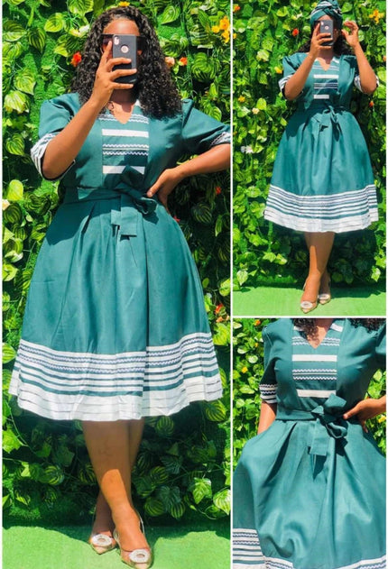 Teal midi shirt dress with striped hem and bow belt