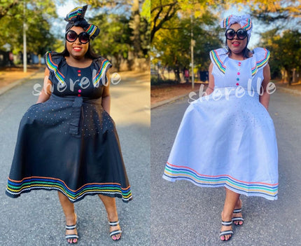 Ruffle sleeve dress in black and white with rainbow trim, button front bodice