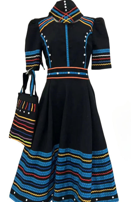 Geometric beaded midi dress, black with blue striped trim and white bead accents