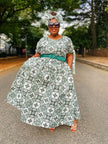 Printed maxi dress with full skirt, green and white pattern, short sleeves, belt