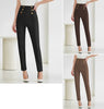 High-waist pants with gold button detail and tailored slim legs, dark color