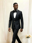 Men's black tuxedo suit with satin lapels, bow tie, and vest