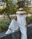White wide-leg crew-neck jumpsuit with short sleeves and relaxed fit