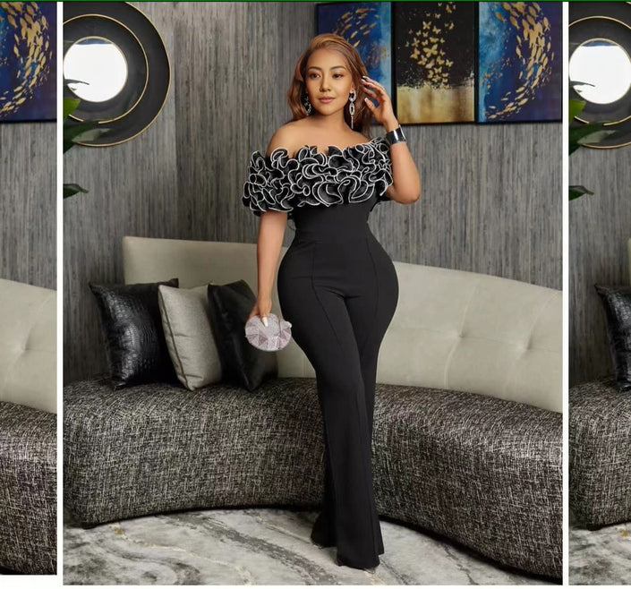 Off-shoulder lace jumpsuit in black with lace off-shoulder ruffle and straight legs