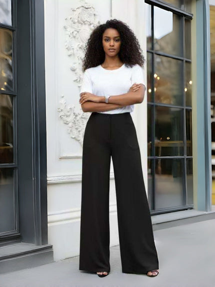 Black high-waist wide-leg tailored pants with front button closure