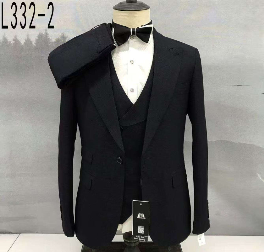 Dark single-breasted suit jacket with notched lapels, matching vest and bow tie