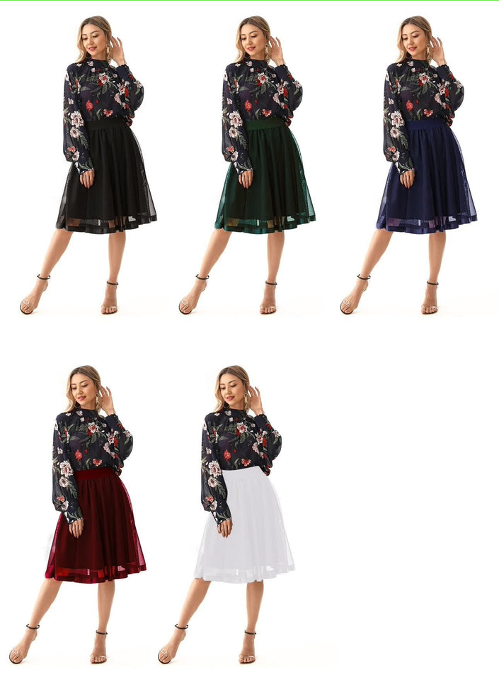 Pleated A-line skirt with elastic waistband, layered pleats, mid-calf length