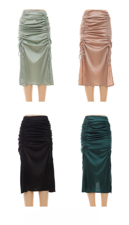 Ruched midi skirts in mint, dusty pink, black, and dark green—adjustable stretch waist