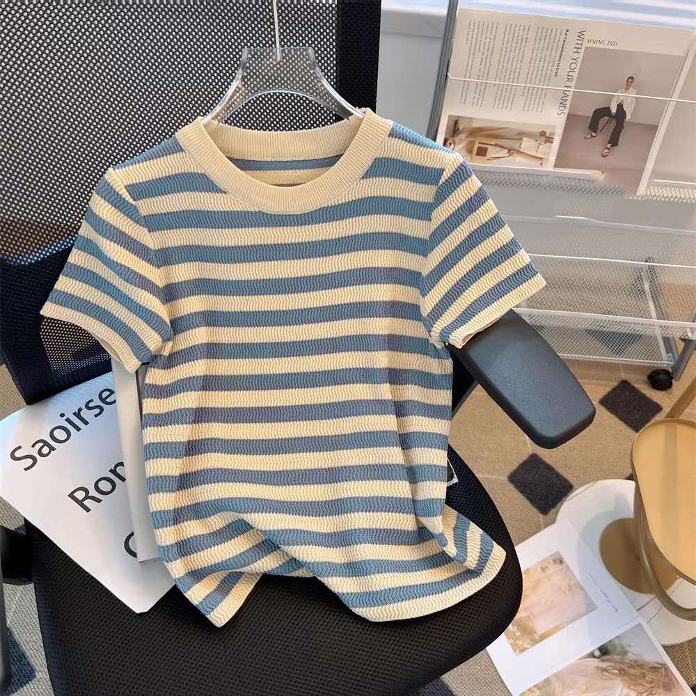 Light blue and cream striped knit top on hanger, short sleeves, crew neck