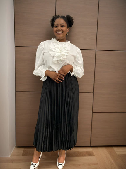 White ruffle blouse with sculpted layered collar and puff sleeves