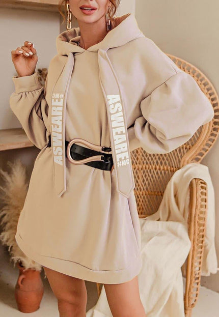 Oversized hoodie dress in beige with front pocket and drawstring hood.