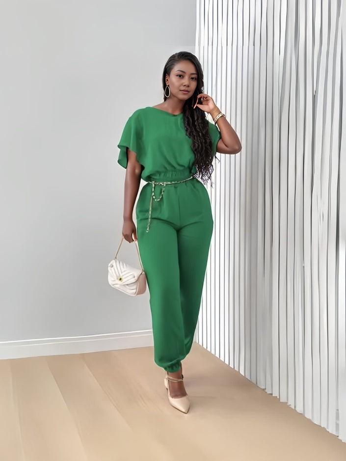 Green stretch twin set with short-sleeve top and tapered jogger pants, tie waist