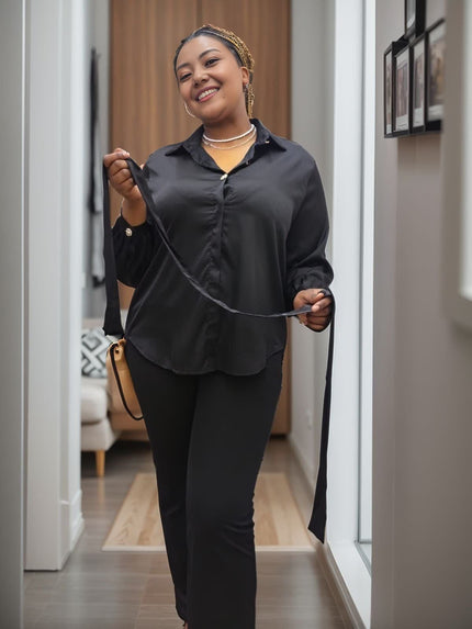 Black long-sleeve bow tie blouse with button front and tied neck detail