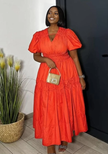 Red-orange puff sleeve tiered maxi dress with gathered waist and V-neck