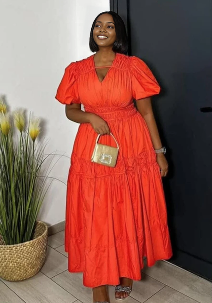 Red-orange puff sleeve tiered maxi dress with gathered waist and V-neck