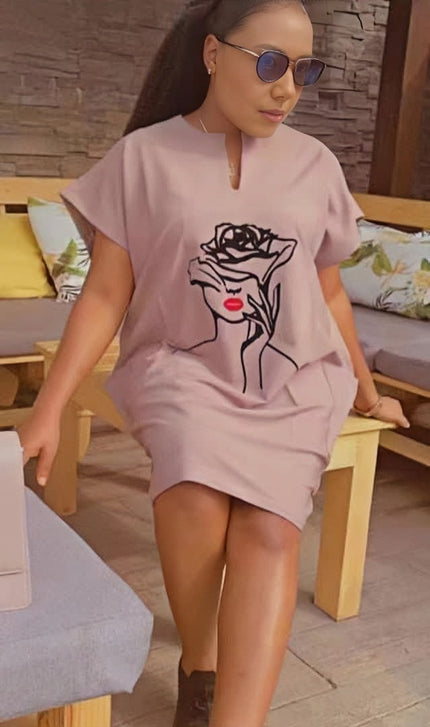 Light pink mini dress with short sleeves and rose graphic front