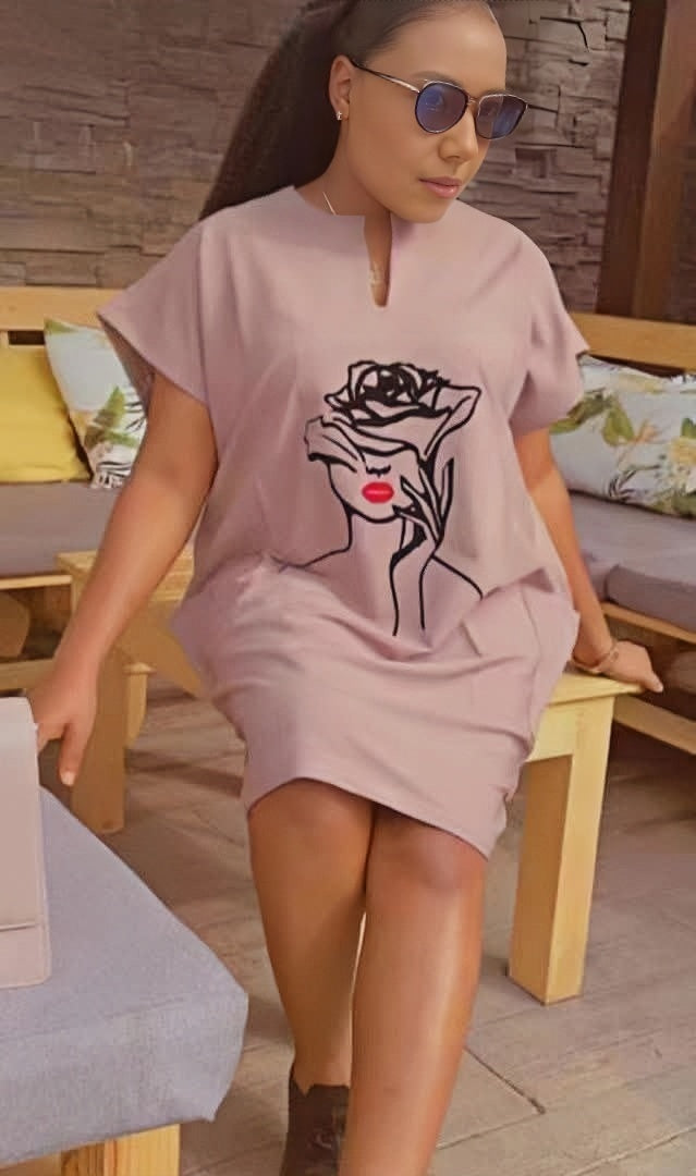 Light pink mini dress with short sleeves and rose graphic front