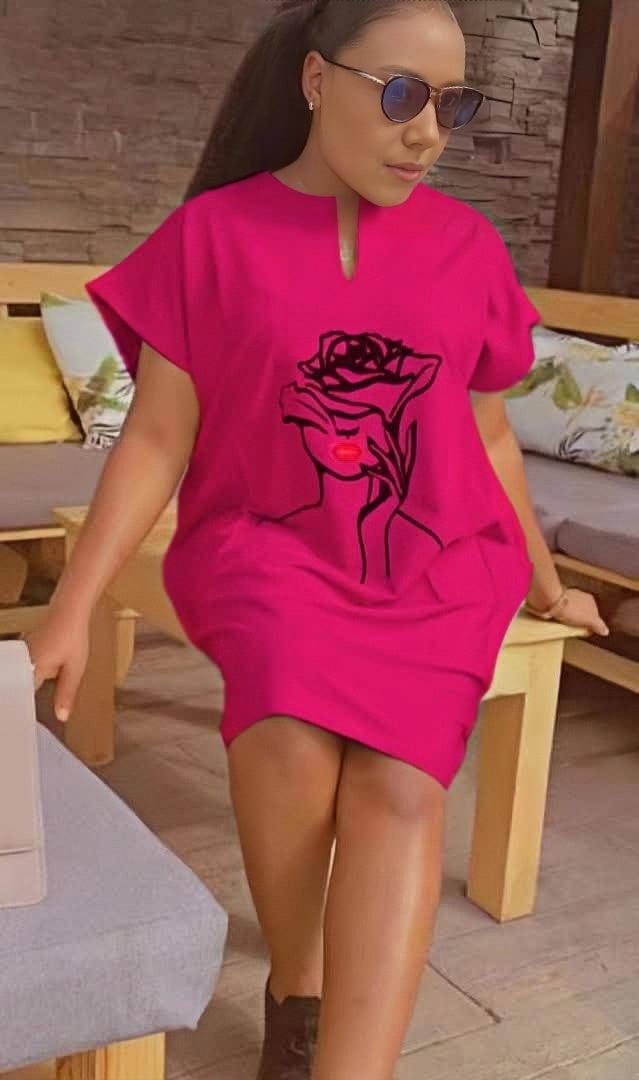 Deep pink mini dress with short sleeves and rose graphic front