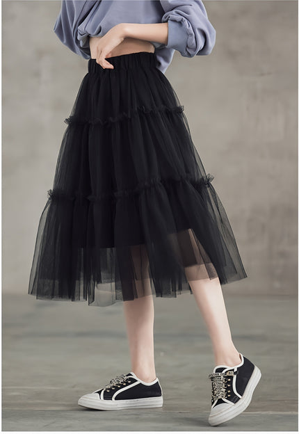 Layered black tulle midi skirt with tiered ruffles and elastic waistband