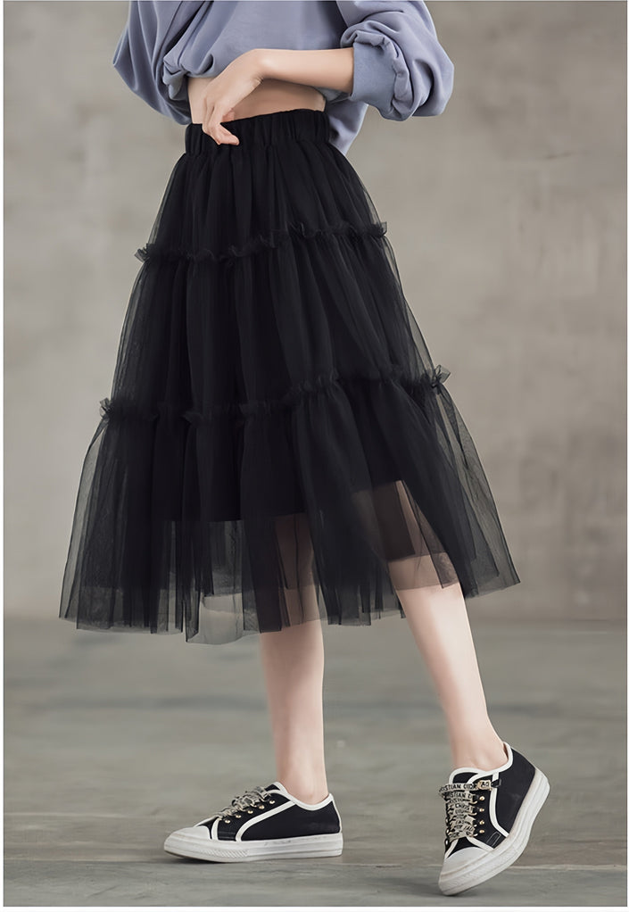 Layered black tulle midi skirt with tiered ruffles and elastic waistband