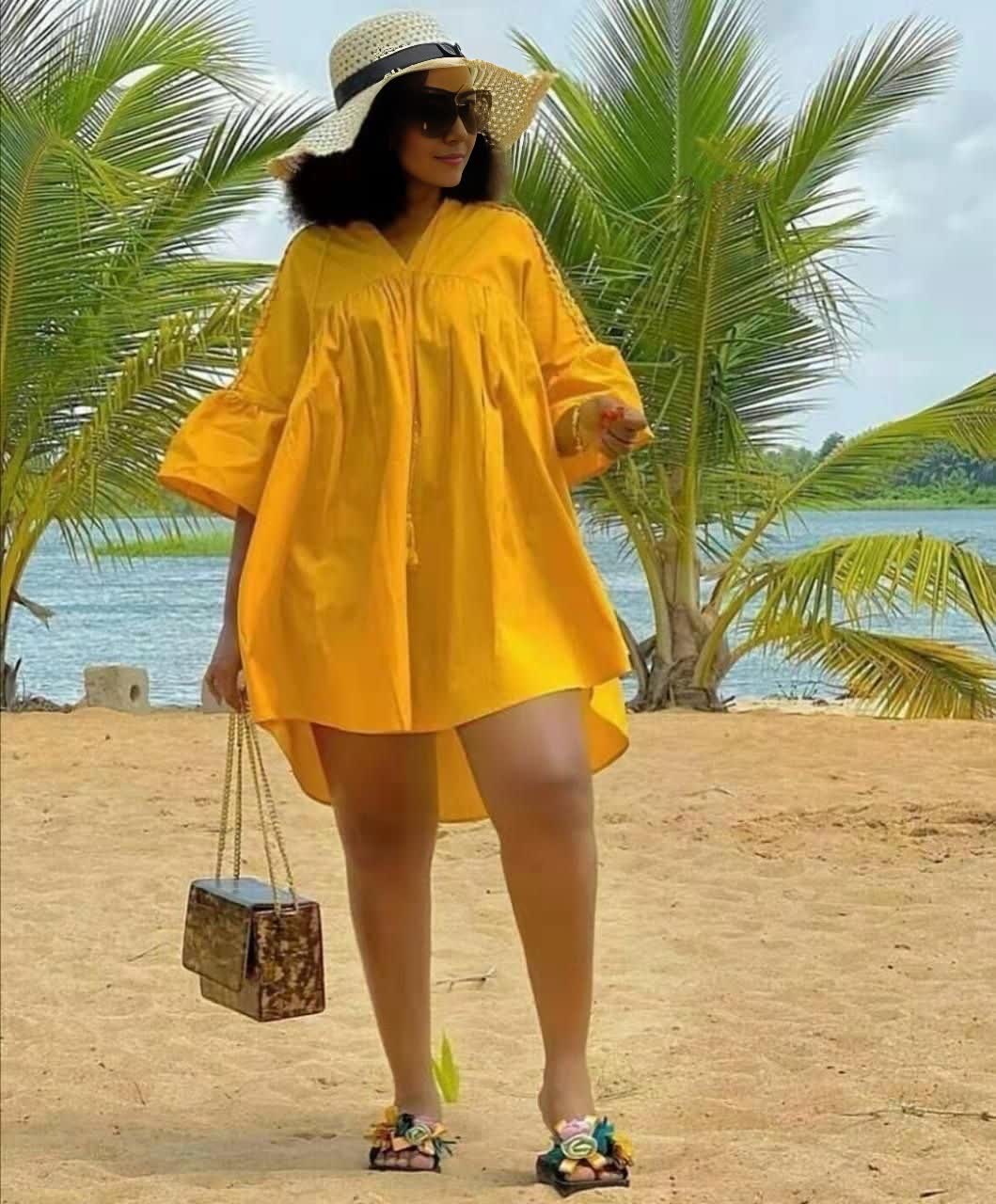 Plus size mini dress, yellow relaxed fit with V-neck and long loose sleeves