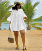 Plus size mini dress, white relaxed fit with V-neck and long loose sleeves