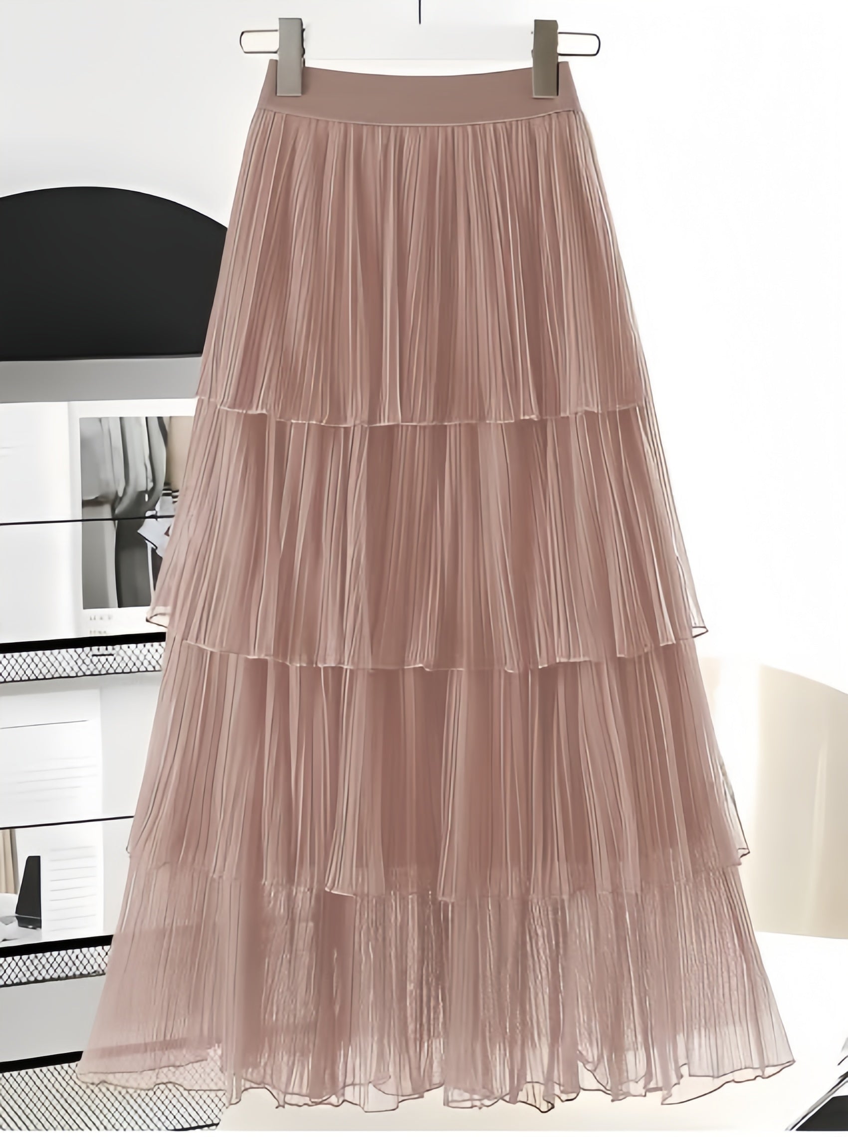 Peach layered pleated skirt with elastic waistband and tiered ruffles