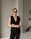 Sleeveless V-neck button-front vest top, black with chest patch pocket