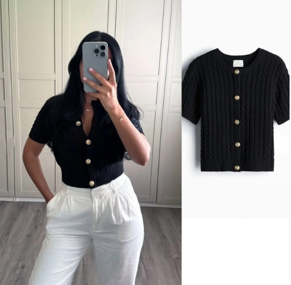 Black short-sleeve knit cardigan top with button front and gold buttons