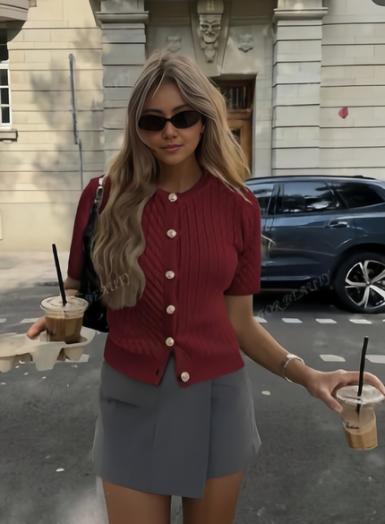 Maroon short-sleeve knit cardigan top with gold button front and ribbed knit
