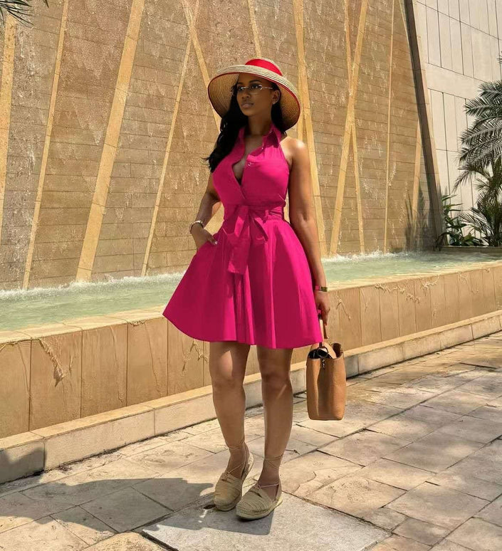 Hot-pink sleeveless tie-waist A-line dress with halter neckline and flared skirt