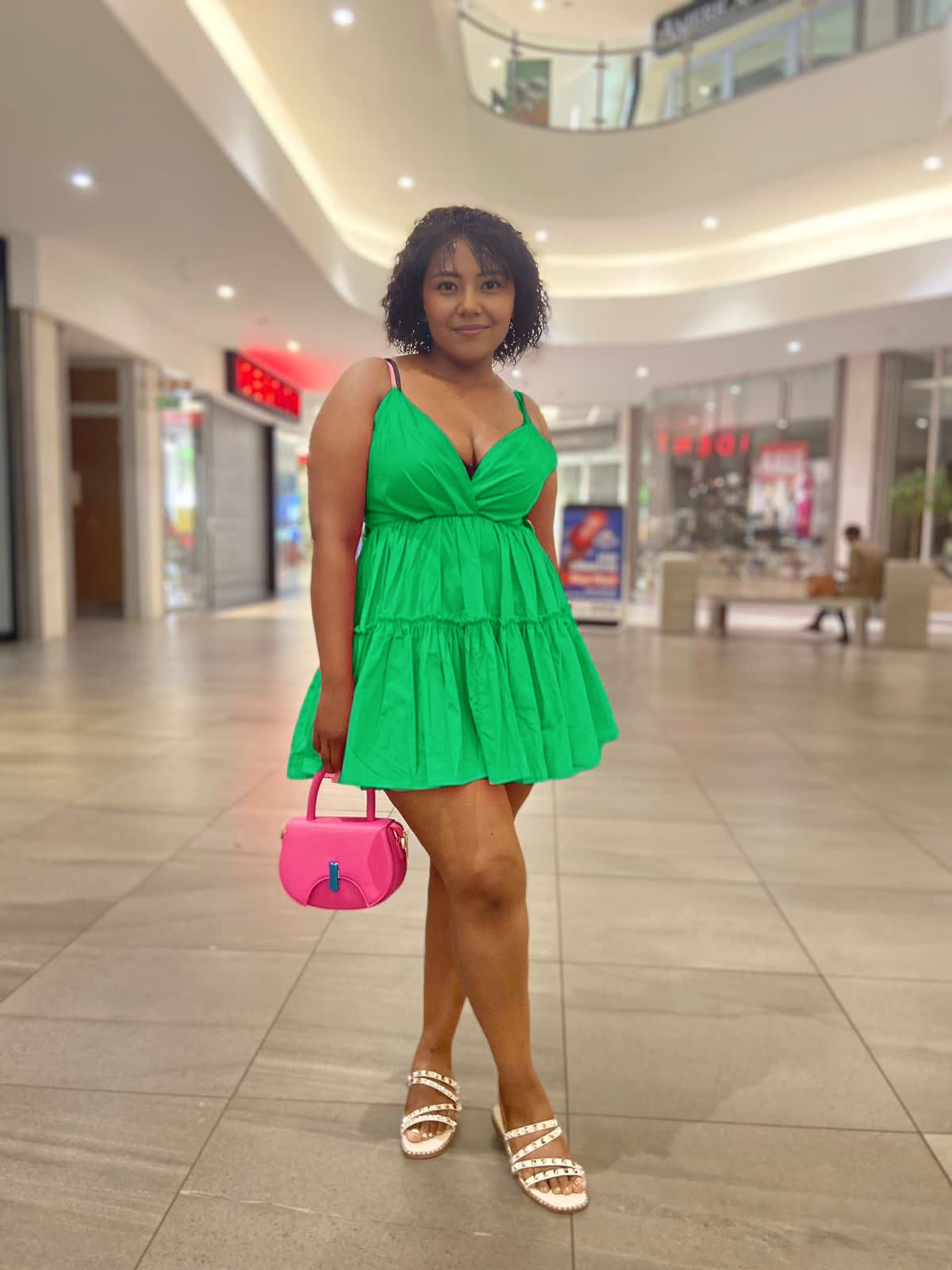 Green mini ruffle V-neck dress with gathered waist and tiered skirt