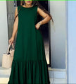 Green sleeveless maxi dress with gathered ruffle hem detail