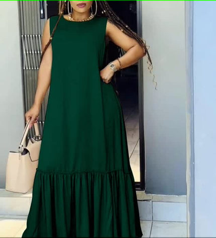 Green sleeveless maxi dress with gathered ruffle hem detail