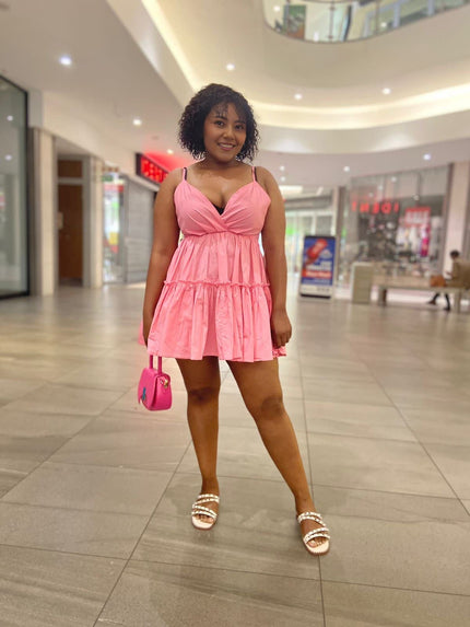 Pink mini ruffle V-neck dress with gathered waist and tiered skirt