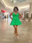 Green mini ruffle V-neck dress with thin straps and tiered flounce skirt