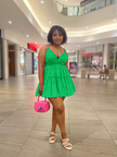 Green mini ruffle V-neck dress with gathered waist and tiered ruffles